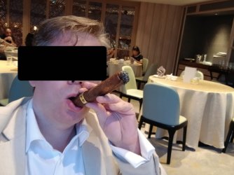 EdibleCigarInMouth.jpeg EdibleCigarInMouth.jpeg