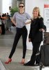 Miranda+Kerr+Miranda+Kerr+Arriving+LAX+Airport+xrCavo1o_-Sl.jpg
