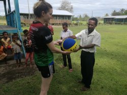 120 - Alisha presenting sports equip and educational packs to Buna school principal.jpg 120 - Alisha presenting sports equip and educational packs to Buna school principal.jpg